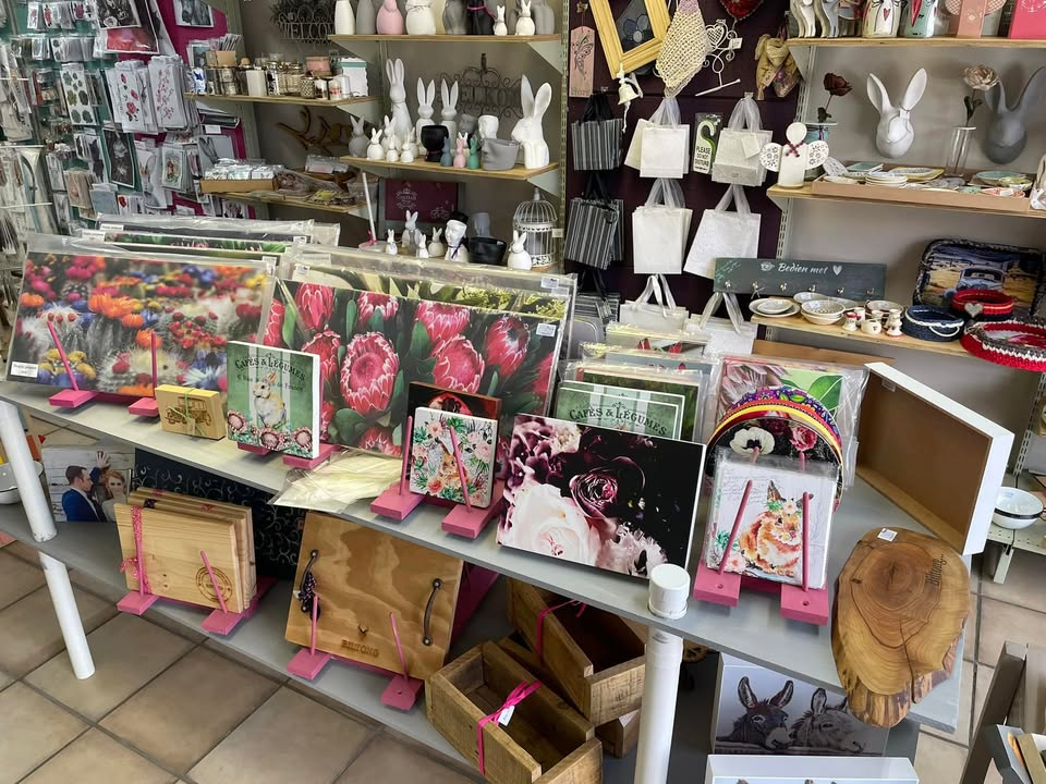 Craft supplies, decorative papers and gifts on display inside U’neeque & Special.